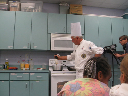 American Culinary Federation Chef David S. Bearl teaches RB Hunt Elementary first graders from Christine Skipp’s and Lori Hall’s class, about different ways to prepare 11 different varieties of pumpkins and how cooking can teach language, history, math and science.  (Photo by Lanna Kirk)
