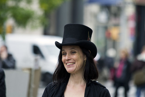 Lady with a top hat and a smile by Frank Fullard