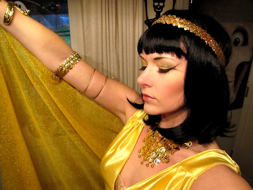 Cleopatra with arm raised