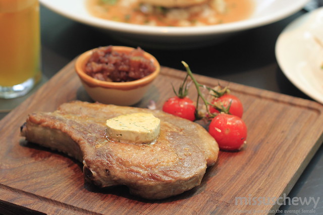 On the bone: 300g pork chop, Kurobuta pork, 100% Berkshire from Victoria, Australia with pear chutney. Served with roast vine-ripened cherry tomatoes and house butter 36