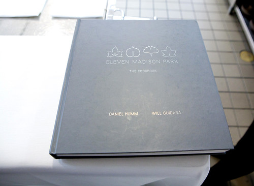The restaurant's copy of their own cookbook for guests to preview it