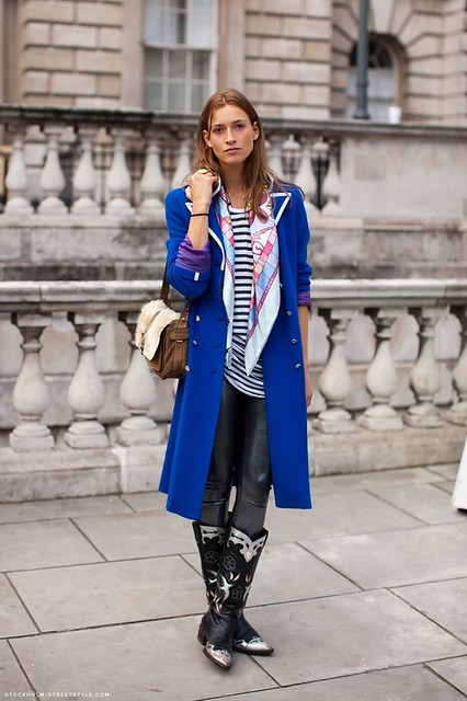blue coat and leggings in boots