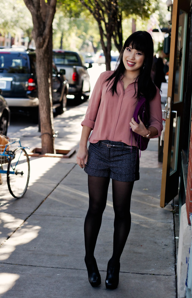 forever 21 pink sheer chiffon button-up shirt, express lace panel tweed shorts, dkny black tights, jessica simpson livia ankle boots, charlotte russe metallic silver skinny belt, michael kors rose gold small runway watch mk5430, rebecca minkoff mac clutch in magenta