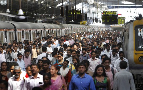 Commuters alight from local suburban trains at a Church gate station in Mumbai, India. Nearly 7 million commuters use the overtaxed suburban rail network each workday in Mumbai. by Pan-African News Wire File Photos