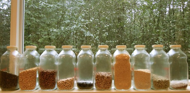Beans and lentils in old school juice containers