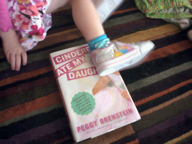 Her new princess shoes w my new book.
