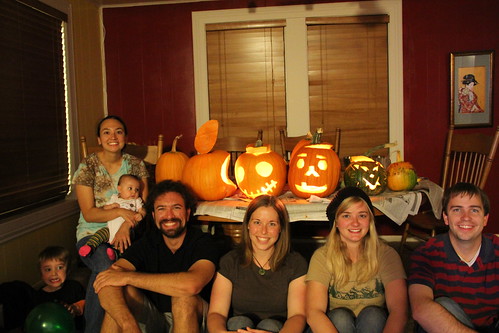 Pumpkins and their respective carvers