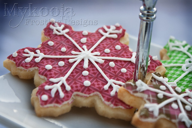 Snowflake cookies with edible Frosting Designs
