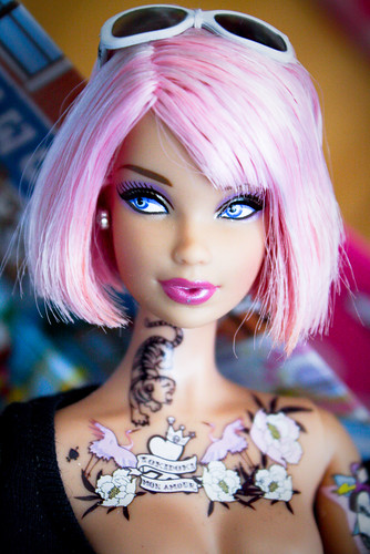 to have tattoos? Barbie