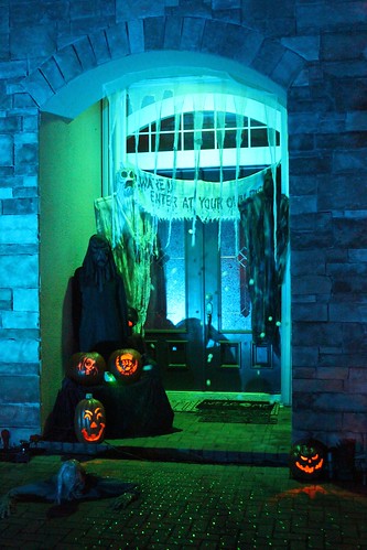 Front door zombie, pumpkins, bubble fogger, and live costumed scare