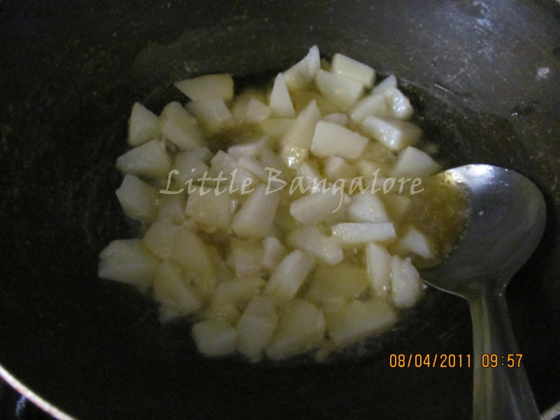 Potatoes pieces while frying