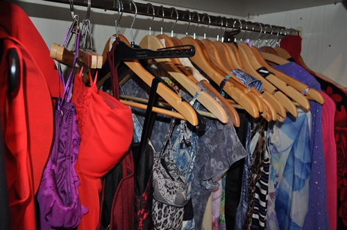 colorful dresses and clothes in the closet