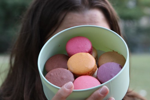 Jen with Macarons on the Champ de Mars