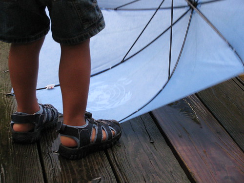feet and umbrella