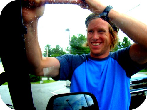 Mikey scrubbing off the bugs from Edmunds windshield.