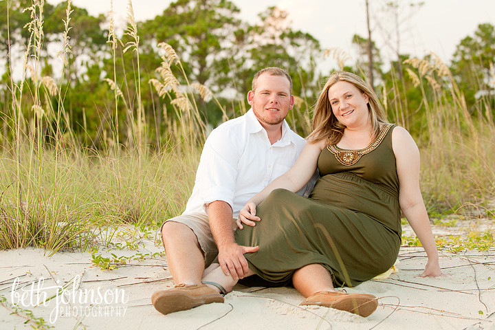 maternity photography session by sea oats on beach