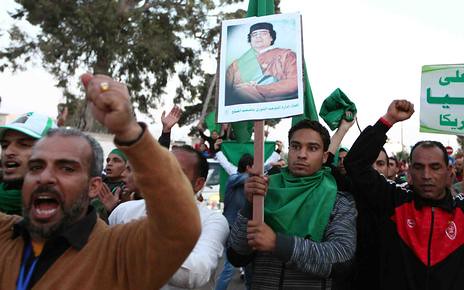 Libyans stand firm in defense of their revolution led by Muammar Gaddafi. US imperialism and its NATO allies have bombed the North African state since March 19, 2011. by Pan-African News Wire File Photos