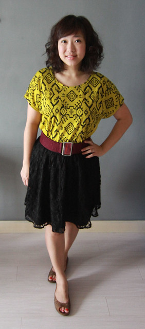 Cross stitch patterned tee, lace skirt, jewelled belt