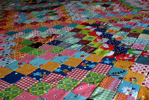 quilt top on bed - detail