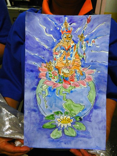 Blue watercolor: Padmasambhava, Buddhist teacher of the World, White Tara's lotus, held by a volunteer backstage preparing for the mandala offering to His Holiness 14th Dalai Lama of Tibet, Kalachakra for World Peace, Verizon Center, Washington D.C., USA by Wonderlane