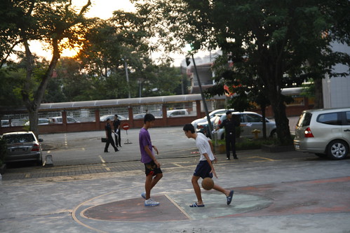 Kids playing basketball at Chung Hwa High School