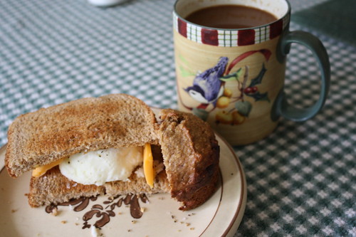breakfast 8-6-11, poached egg, coffee, half of a muffin