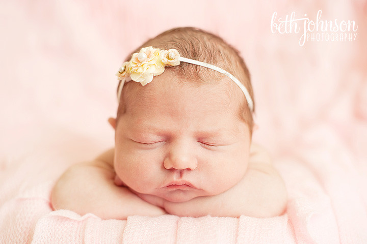 newborn baby girl in tallahassee on pink blanket