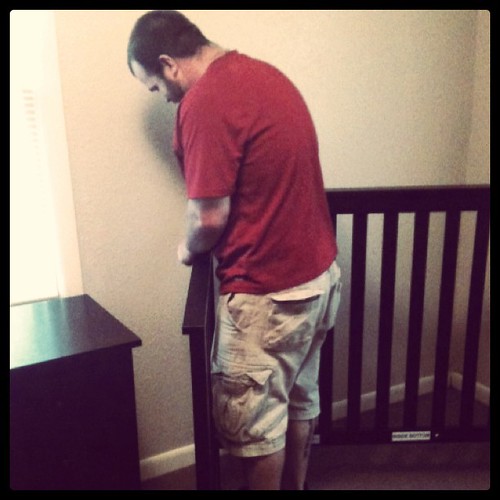 Hubby putting the crib together!