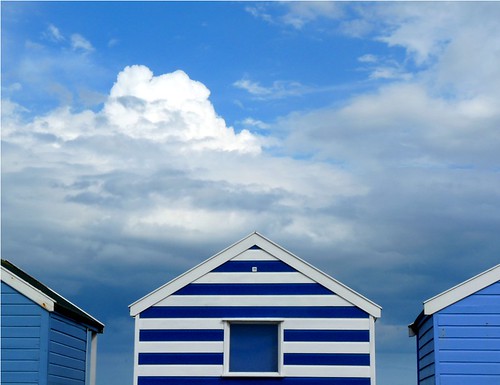 Beach huts in blue by PhotoPuddle