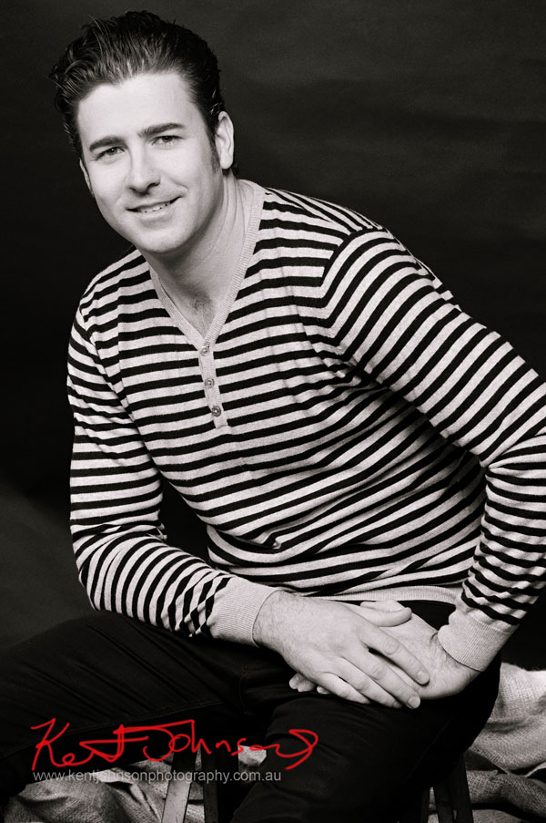 Male Modelling Portfolio, seated, striped casual shirt and jeans
