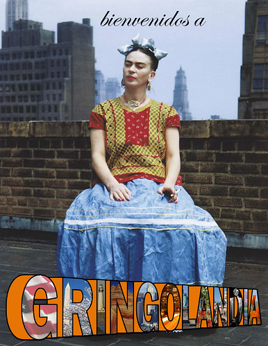 The phrase bienvenidos a gringolandia is superimposed over an image of Frida Kahlo sitting on a rooftop in New York. The gringolandia is written in the style if iconic 'greetings from... postcards' with images of America inside of the 3D letters.