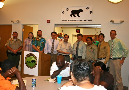 Department of Conservation and Recreation staff and Bear Creek Academy staff gather for a group photo.