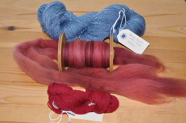 Two skeins and a bobbin.