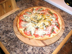 home made pizza, pizza maker, making pizza, 