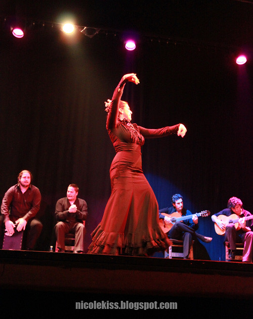 lady in black doing flamenco dance
