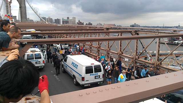 #OccupyWallStreet marching on the Brooklyn Bridge