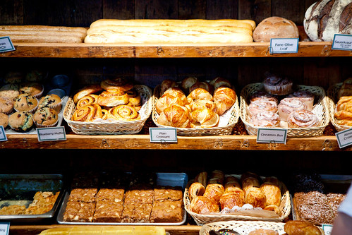 Shelf of freshly baked breads and pastries