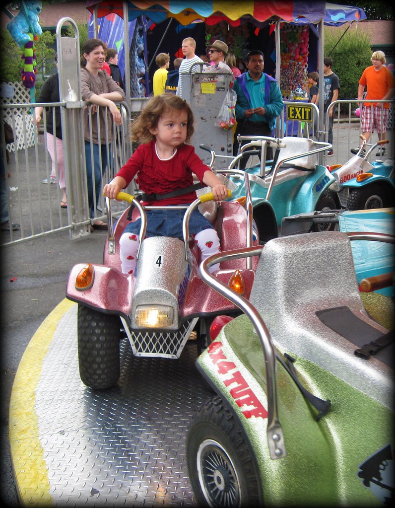 Serious Girl on the Festival Ride