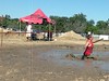 SEVERAL SAY THE MC ENCOURAGED RUNNERS TO DIVE INTO THE MUD PIT! IS THIS HIIM