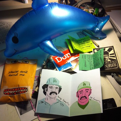 Okay amazing package by Paul Windle- Rad zines and an inflatable dolphin. by Michael C. Hsiung