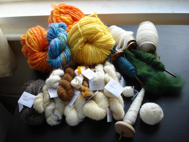 Big pile of handspun tour de fleece spindle spun yarn