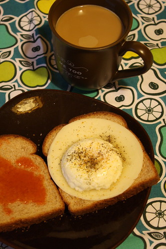 coffee, poached egg, toast, provolone cheese