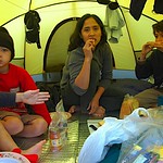 Breakfast in the tent. Dave (only hand), Nick, Imas and Albert.