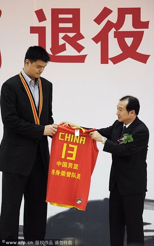 July 25th, 2011 - Yao Ming receives a jersey with his old number on it