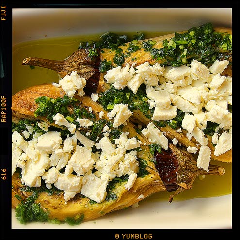 Grilled aubergines with olive oil, garlic, parsley and feta