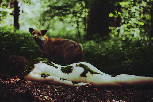 it is the fox who cares about girl's soul. she died in the woods and now her flesh is overgrown by moss. by laura makabresku