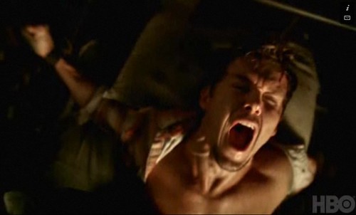 Jason Stackhouse screaming, tied to a bed