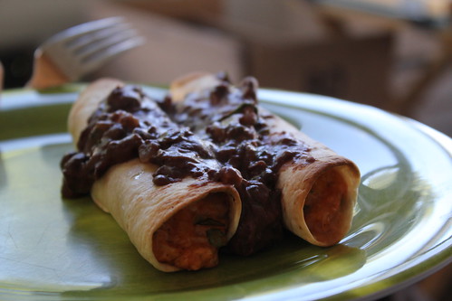 Chicken taquitos and refried black beans