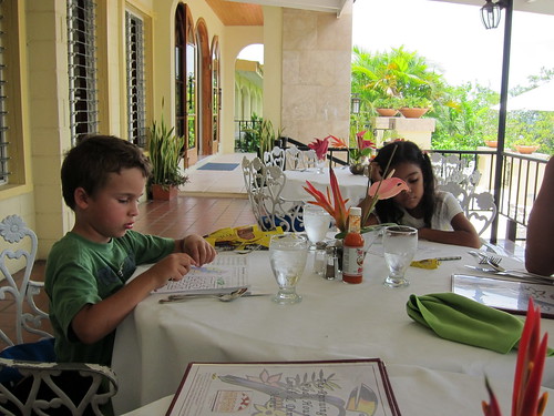 Ezra and Bethany work on the kids' menu activities