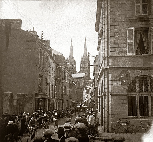 This photo shows the peloton passing through the city of Quimper with its characteristic cathedral spires. The 210km 4th stage of the 1930 Tour started in Brest and finished in Vannes and was won by Omer Taverne (Belgium) in a time of 6h56'03". The Italian Learco Guerra continued leading the Tour until the 9th stage when Frenchman Andre Leducq took it in the Queens stage from Pau to Luchon. Photo: The Cycling History Collection